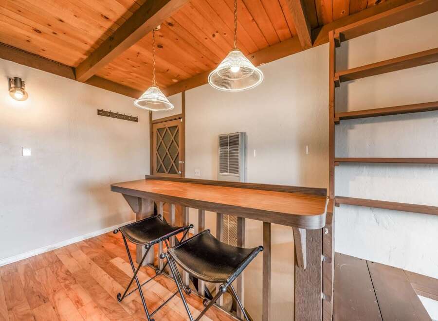 Discover the charm of this unique property featuring a stylish bar area, perfect for entertaining.
