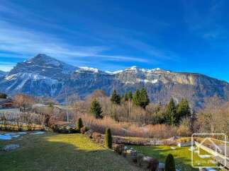 Experience breathtaking mountain views from this stunning property.