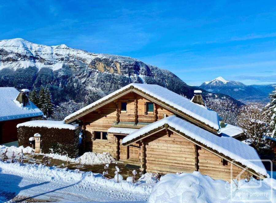 Discover the charm of this stunning chalet nestled in a picturesque winter wonderland.