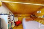 Discover this charming attic space, perfect for a cozy retreat or a creative studio.
