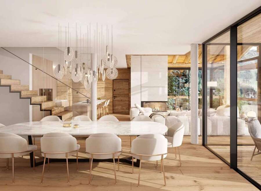Experience luxury living in this stunning property featuring a modern dining area with a large marble table and elegant chairs.
