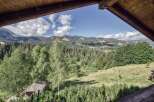 Experience breathtaking mountain views from this charming property.