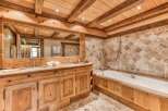 Step into rustic luxury with this stunning bathroom.