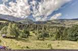 Nestled in the heart of nature, this property offers breathtaking views of the mountains and lush greenery.