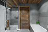 Step into luxury with this stunning bathroom featuring a modern design and high-end finishes.