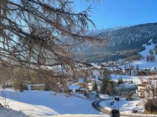 Discover a charming winter retreat nestled in a picturesque mountain village.