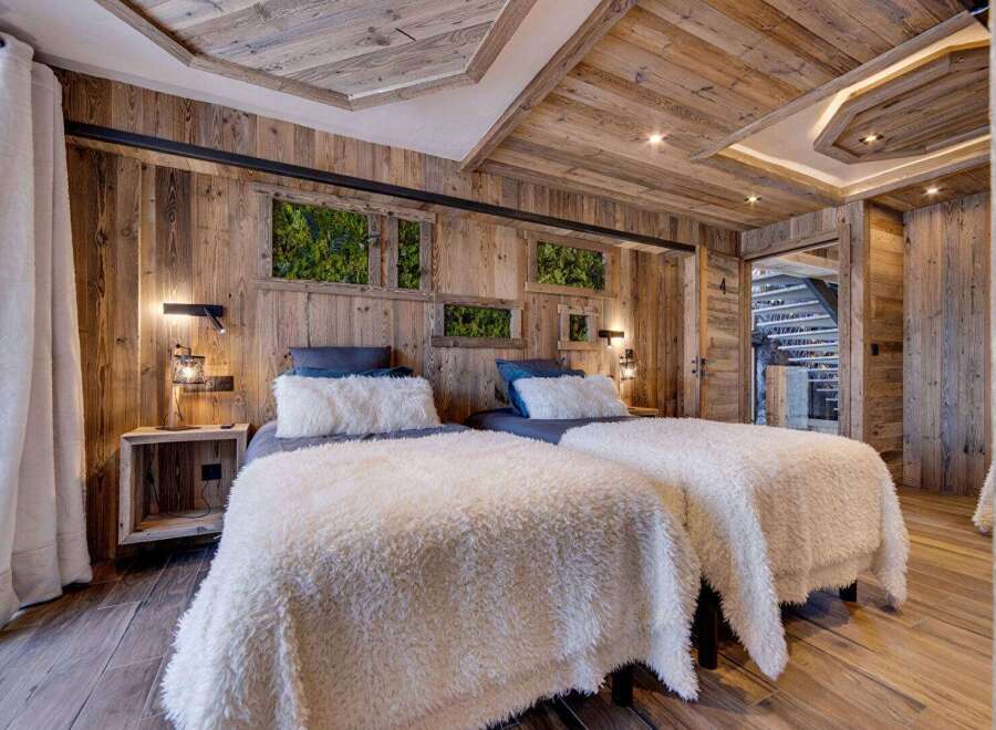 Experience rustic luxury in this stunning bedroom.