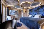 Experience luxury and comfort in this stunning bedroom.