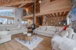 Experience the epitome of luxury living in this stunning chalet, boasting a warm and inviting interior.