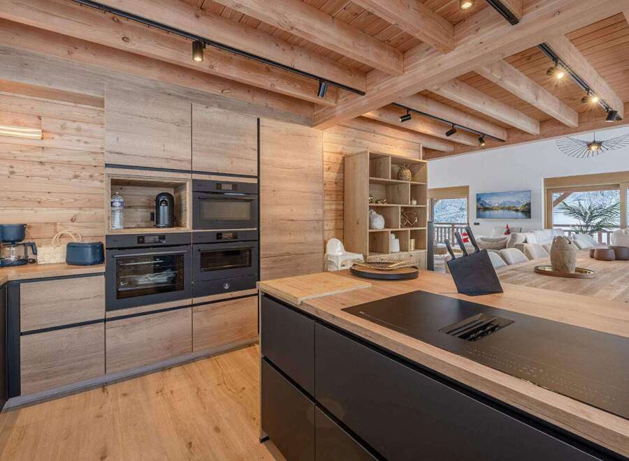 This stunning kitchen boasts a modern design with a rustic touch, perfect for any home.