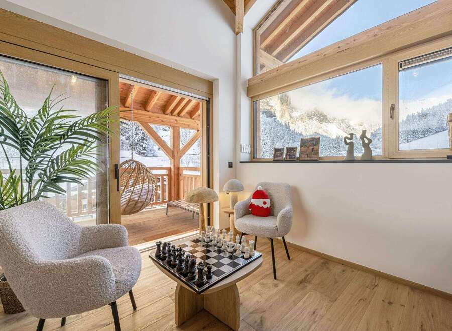 Experience the epitome of luxury living in this stunning property, boasting breathtaking mountain views and a cozy, inviting atmosphere.