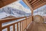 Experience the ultimate winter escape in this stunning property! Enjoy breathtaking views of snow-capped mountains and a charming village from your private balcony.