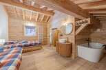 Experience rustic charm in this stunning wooden cabin retreat.