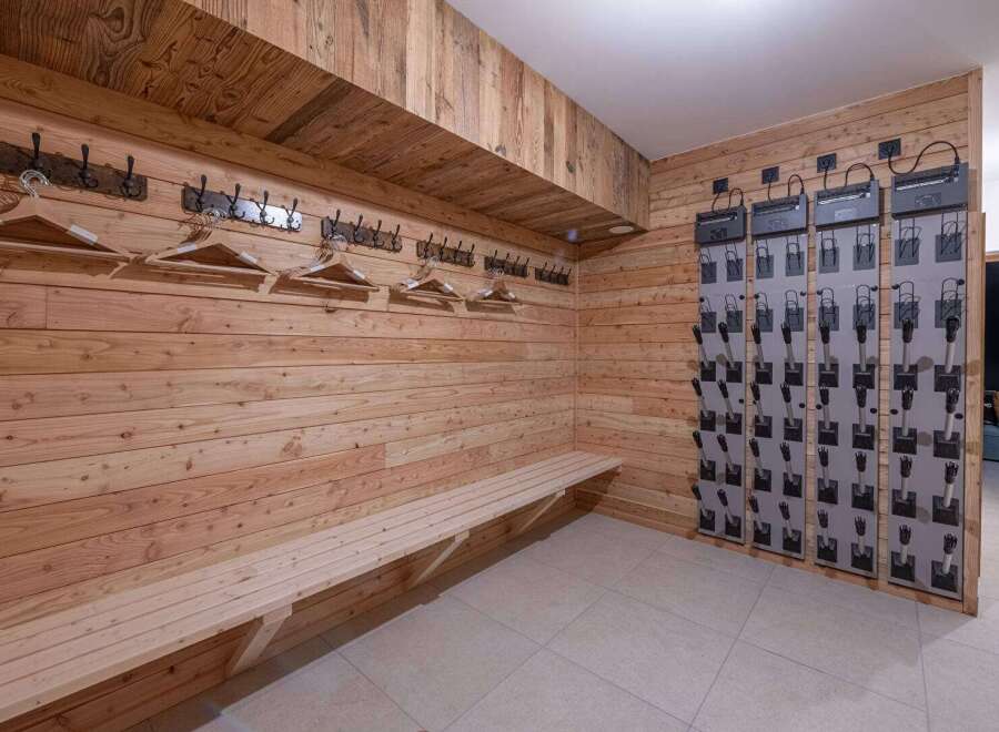 Step into a cozy ski room, perfect for storing and organizing your gear.