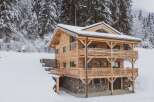 This stunning wooden chalet offers a perfect blend of rustic charm and modern comfort.