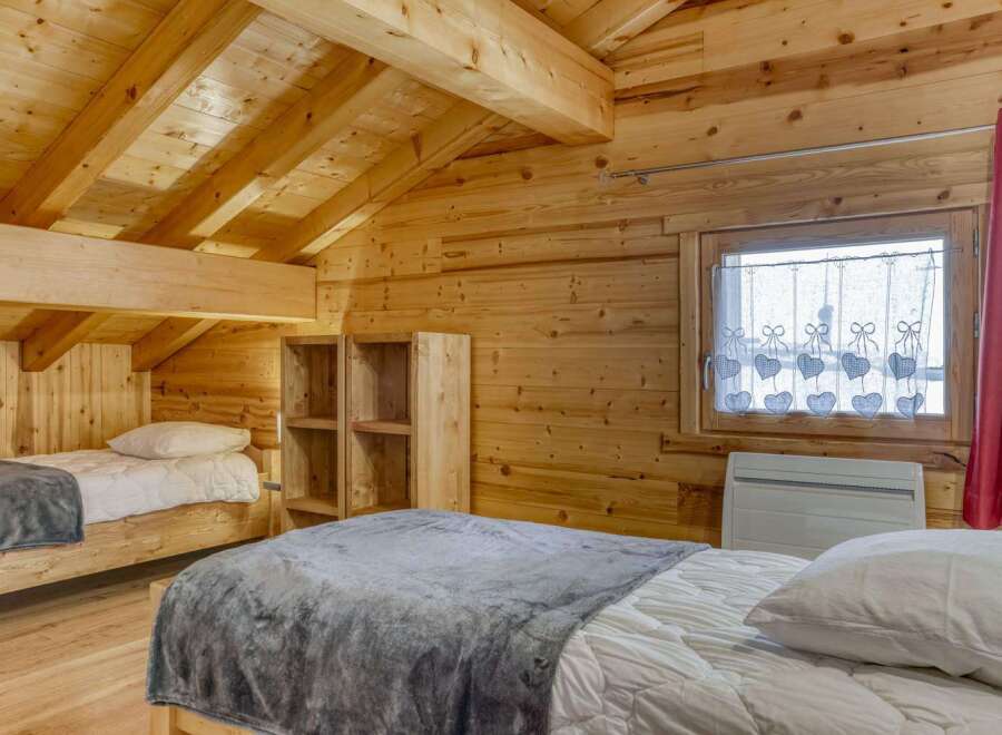 Discover the charm of this cozy cabin retreat, featuring warm wooden interiors and a welcoming atmosphere.