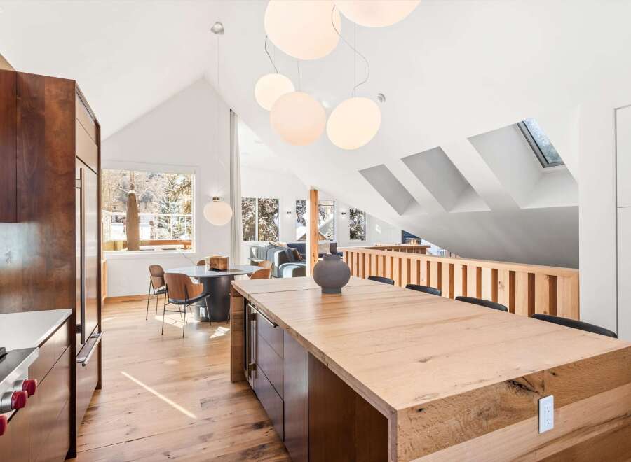 Experience modern luxury in this stunning kitchen! Featuring a spacious island, sleek cabinetry, and high-end appliances, this kitchen is perfect for both cooking and entertaining.