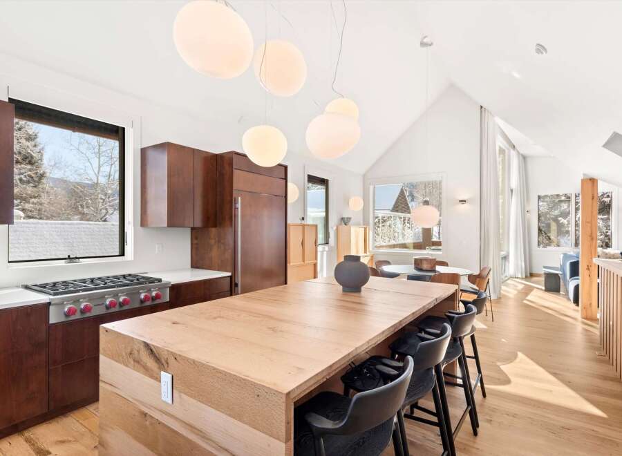 This stunning kitchen boasts a modern design with a spacious island, perfect for entertaining.