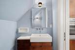 This modern bathroom features a sleek design with a minimalist aesthetic.