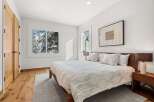 This stunning bedroom features a modern design with a cozy atmosphere.