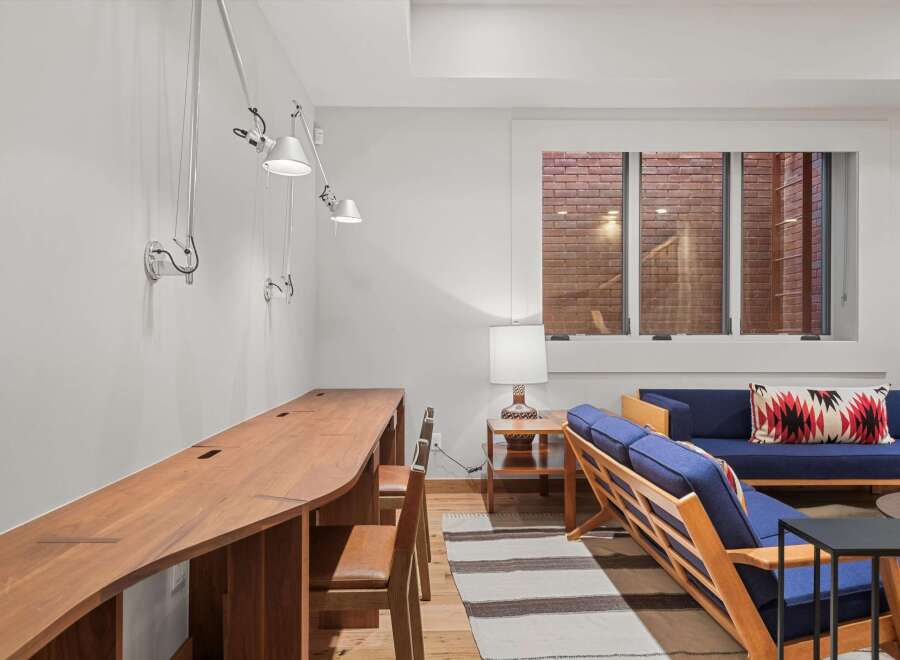 This stunning property boasts a modern and inviting interior, perfect for both work and relaxation.