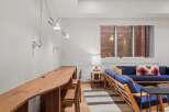This stunning property boasts a modern and inviting interior, perfect for both work and relaxation.
