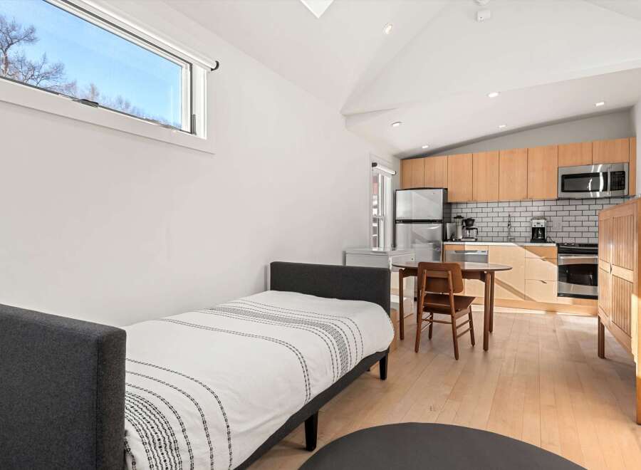 This cozy studio apartment offers a perfect blend of comfort and convenience.