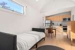 This cozy studio apartment offers a perfect blend of comfort and convenience.