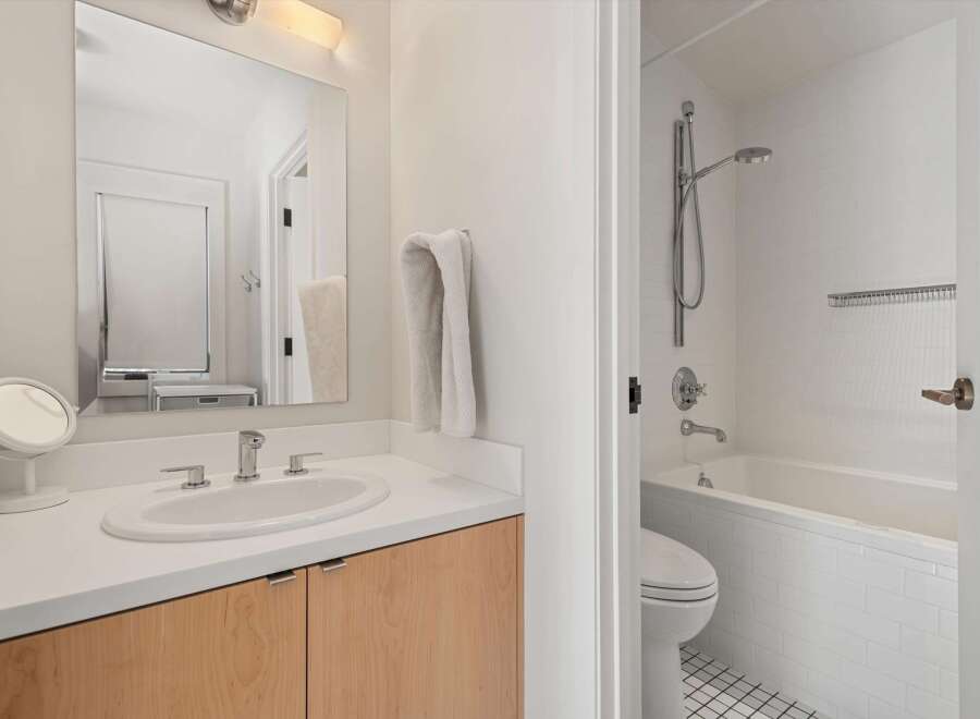 This modern bathroom features a sleek design with a bright, airy feel.