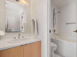 This modern bathroom features a sleek design with a bright, airy feel.