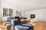 Experience luxury living in this stunning property, featuring a cozy fireplace and a modern, open-concept design.