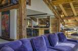 Experience luxury living in this stunning property featuring exposed wooden beams and a modern kitchen.
