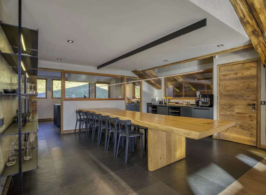 This stunning property boasts a spacious dining area, perfect for entertaining guests.
