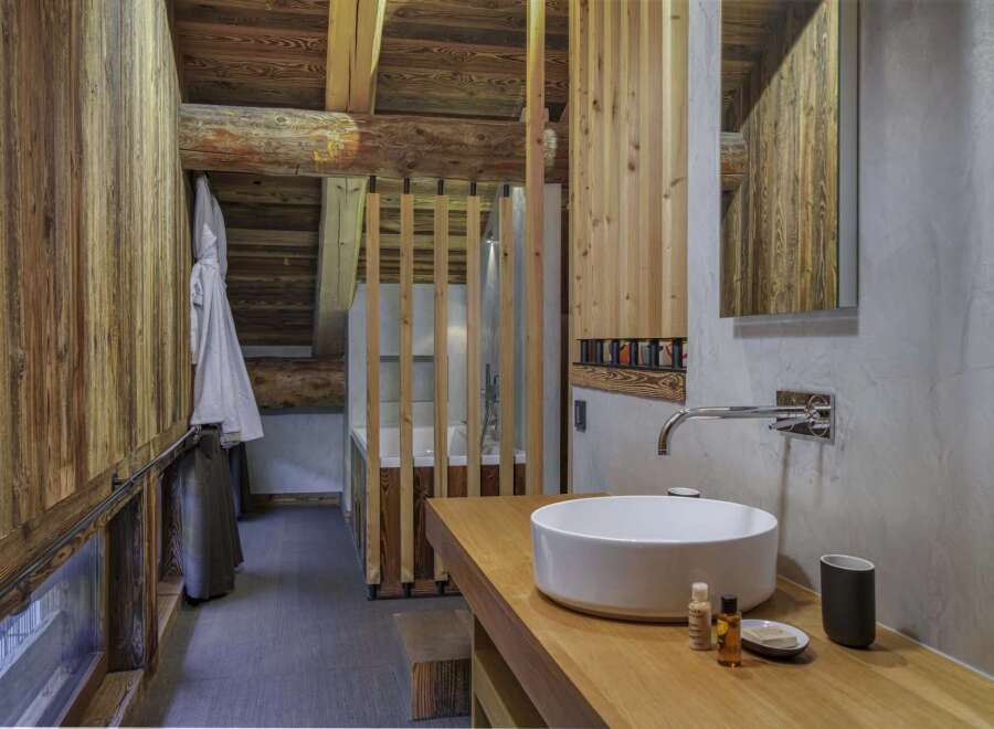 Experience rustic elegance in this stunning bathroom.
