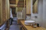 Experience rustic elegance in this stunning bathroom.