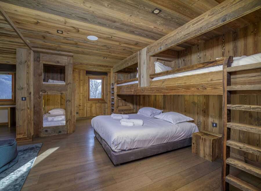 Step into rustic luxury with this stunning wooden bedroom.