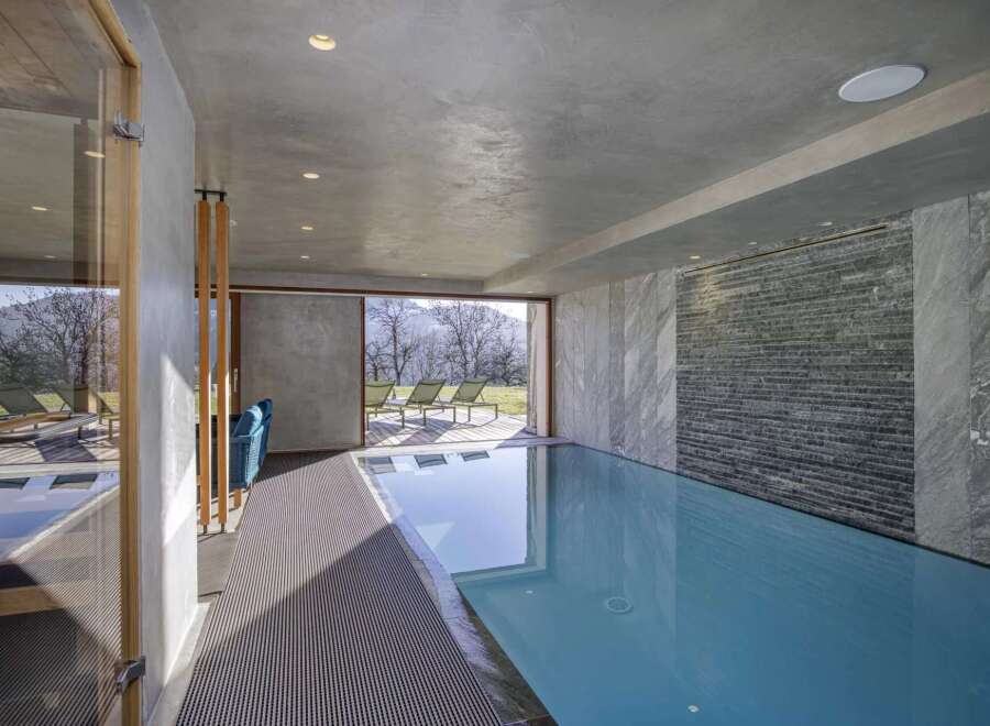 Experience luxury and tranquility in this stunning indoor pool.