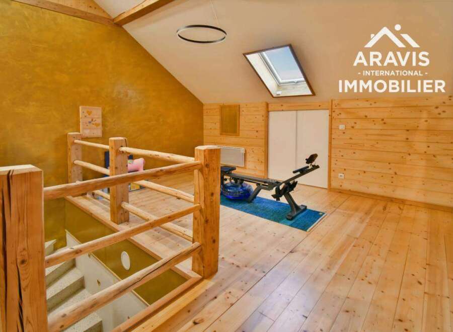 Discover this stunning property featuring a unique interior design with wooden accents and a bright, airy atmosphere.