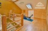 Discover this stunning property featuring a unique interior design with wooden accents and a bright, airy atmosphere.