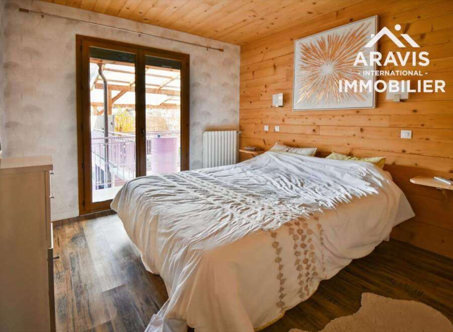 Discover a cozy bedroom retreat with natural wood accents and a serene ambiance.