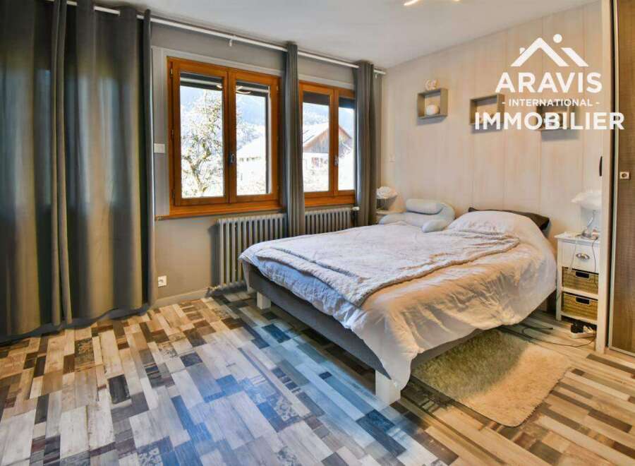Discover a cozy bedroom with a warm and inviting atmosphere.