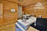 This stunning office space boasts a warm and inviting atmosphere, perfect for productivity and creativity.