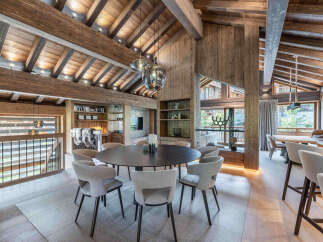 Experience luxury living in this stunning property, showcasing exquisite wooden architecture and a warm, inviting ambiance.