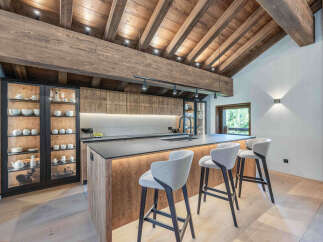 This stunning kitchen boasts a rustic yet modern design, perfect for entertaining and everyday living.