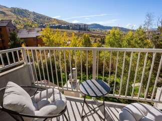 Enjoy breathtaking mountain views from this stunning balcony.