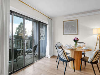 Step into this inviting dining area, perfect for enjoying meals with loved ones.