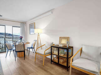 Discover the charm of this inviting living space, perfect for relaxation and entertaining.