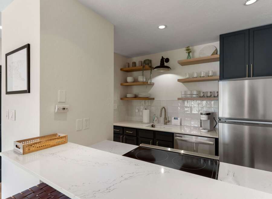 This stunning kitchen boasts modern design and functionality.