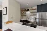 This stunning kitchen boasts modern design and functionality.