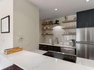 This stunning kitchen boasts modern design and functionality.